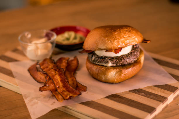 istock hamburguer artisan in table wood background 819946678