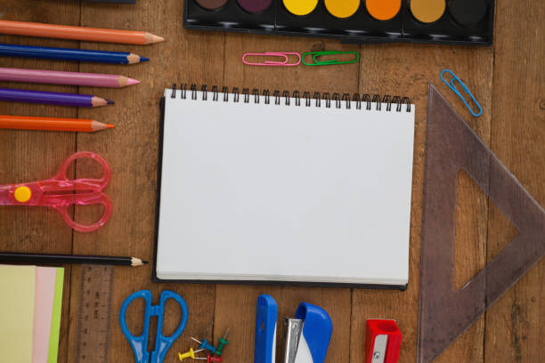 istock Various school supplies on wooden table 819970758