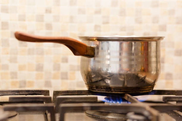 istock eggs boiling on the gas stove 819971526