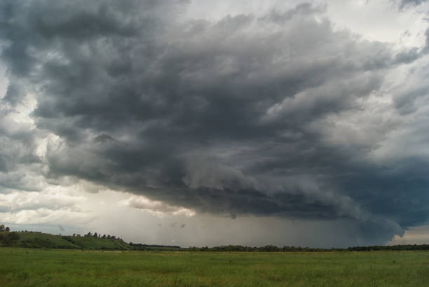istock Storm cyclone over summer fields, hills and forests 819991956