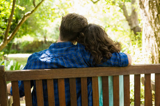 istock Couple embracing each other in garden 820012278