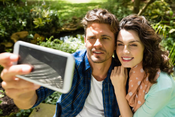 istock Couple taking selfie from mobile phone 820012620