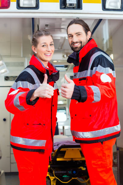 istock Emergency doctor in front of ambulance 820061150