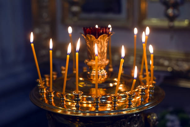 istock candles standing in the Golden candlestick 820066832