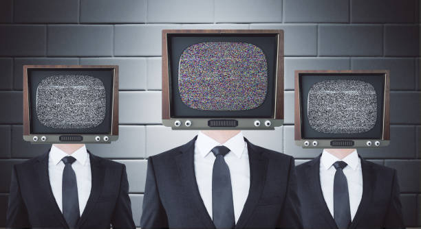istock Retro TV headed businessmen 820075648