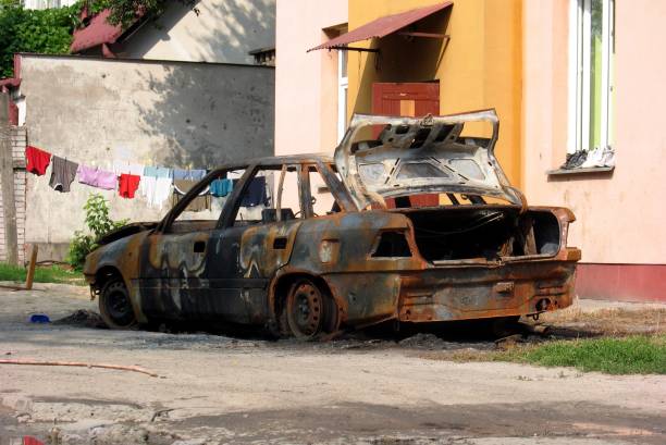 istock Burned car on the street 820094550