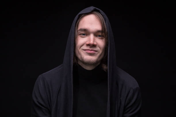 istock Smiling young man in hood 820106122