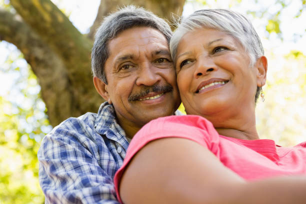 istock Senior couple sitting in garden 820106162