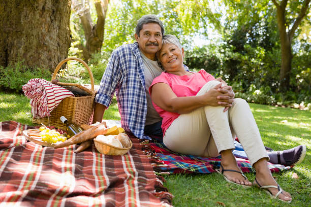 istock Senior couple sitting in garden 820106264
