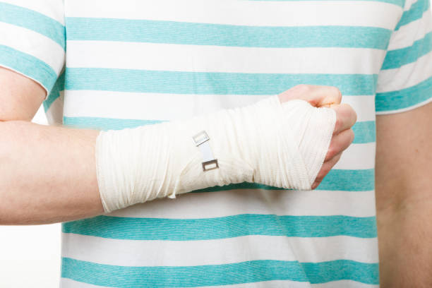 istock Part body man with bandaged hand. 820115780