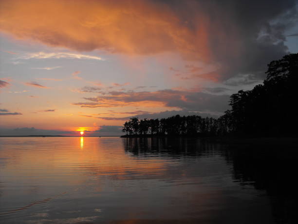 A beautiful pink sunset lights up the clouds over Toledo Bend, USA