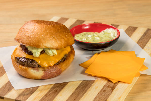istock hamburguer artisan in table wood background 820131324
