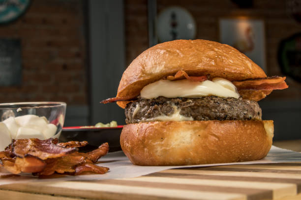 istock hamburguer artisan in table wood background 820131860