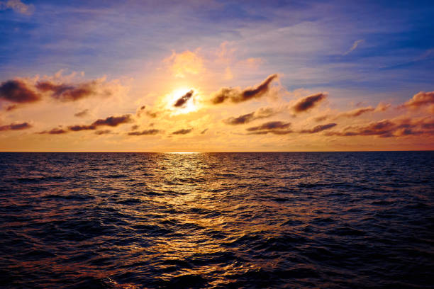 istock sunset landscape. Beautiful sunset above the sea 820141328