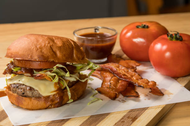 istock hamburguer artisan in table wood background 820148166