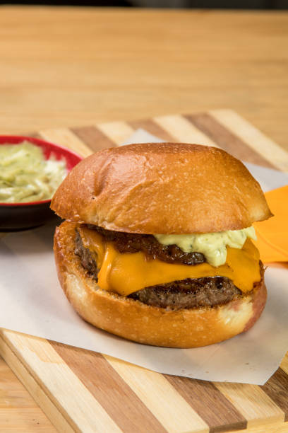 istock hamburguer artisan in table wood background 820155528