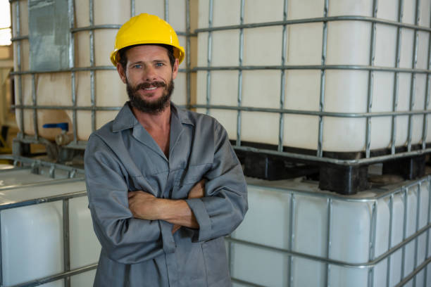 istock Portrait of worker standing with arms crossed 820156010