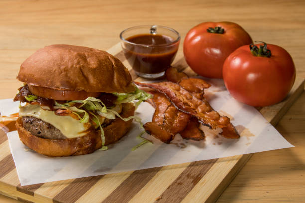 istock hamburguer artisan in table wood background 820160440