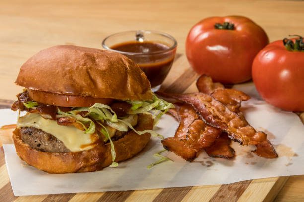 istock hamburguer artisan in table wood background 820176678