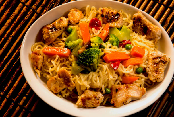 istock chicken and vegetables on ramen noodles 820178760