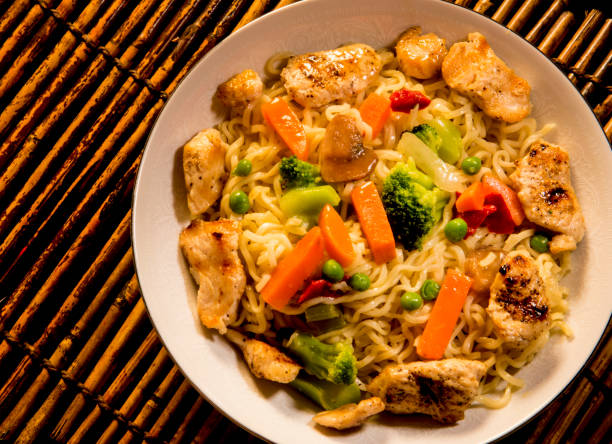 istock chicken and vegetables on ramen noodles 820178798