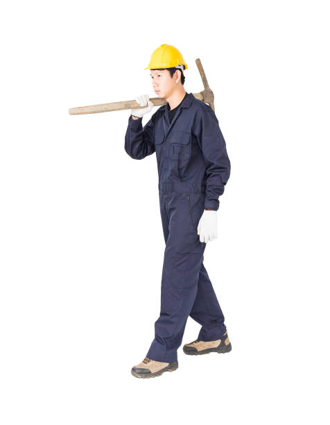 istock Man in uniform hold old pick mattock that is a mining device 820184276