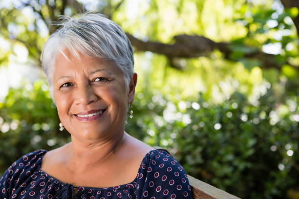 istock Senior woman at the park 820193596