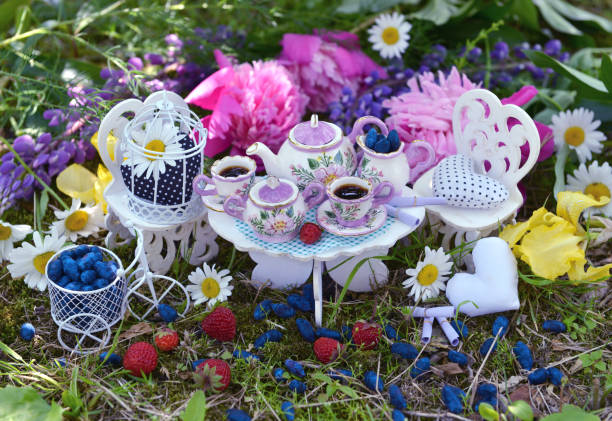 istock Cute furniture with small dishware, vintage objects, berries and flowers 820202254