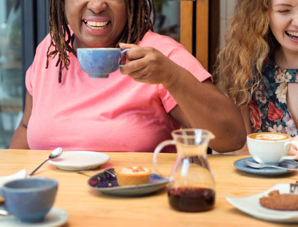 istock Young Women Drinking Coffee Concept 820212654