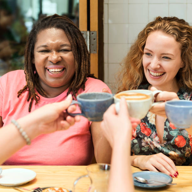 istock Young Women Drinking Coffee Concept 820212674