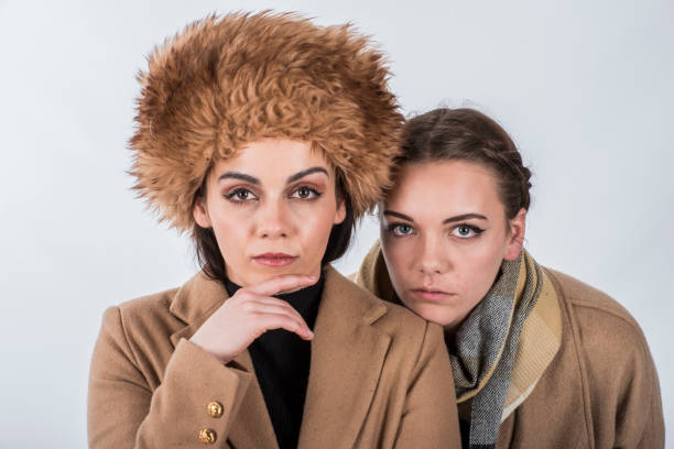 istock Sisters enjoy dressing up and posing like Joan Collins. 820215490