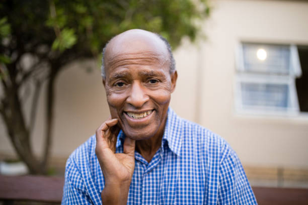 istock Portrait of smiling senior man 820228016