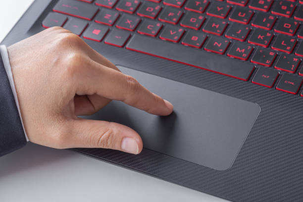 istock business hand working on a laptop touchpad 820237922