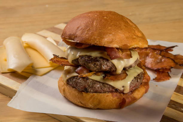 istock hamburguer artisan in table wood background 820238152