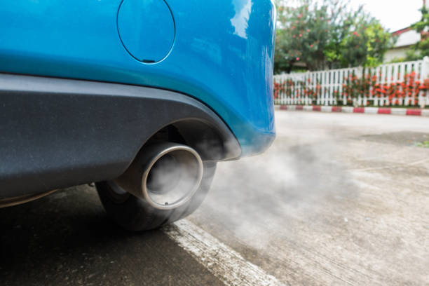 istock Air pollution from vehicle exhaust pipe 820238156