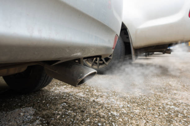 istock Air pollution from vehicle exhaust pipe 820238292