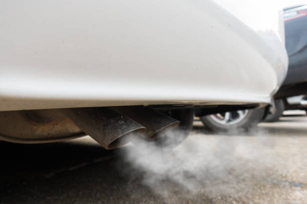 istock Air pollution from vehicle exhaust pipe 820238352