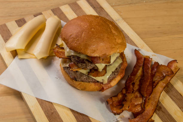 istock hamburguer artisan in table wood background 820238442