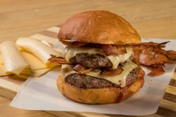 istock hamburguer artisan in table wood background 820242846
