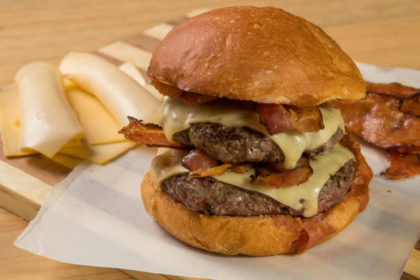 istock hamburguer artisan in table wood background 820243428