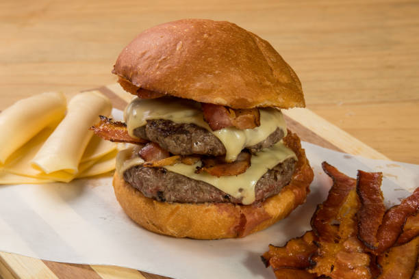 istock hamburguer artisan in table wood background 820243514
