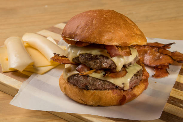istock hamburguer artisan in table wood background 820247710