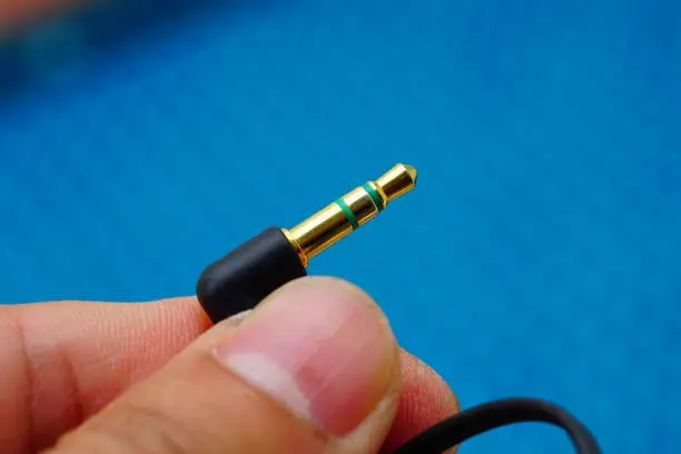 Photo of The tip of an earphone connector plated with gold