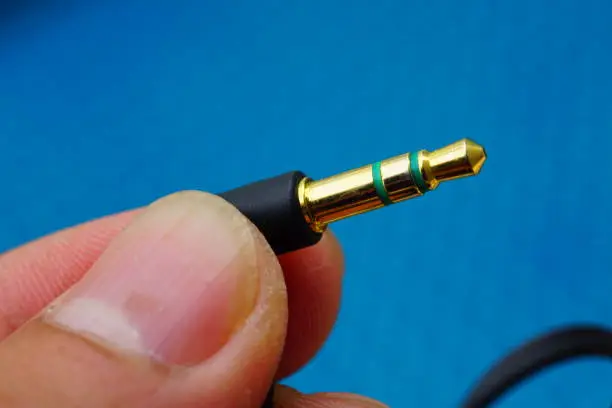 Photo of The tip of an earphone connector plated with gold