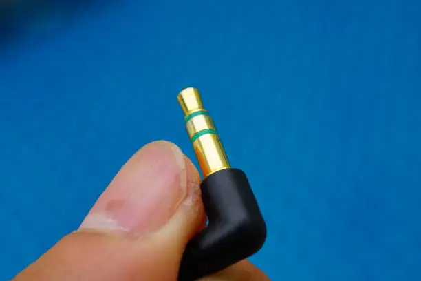 Photo of The tip of an earphone connector plated with gold