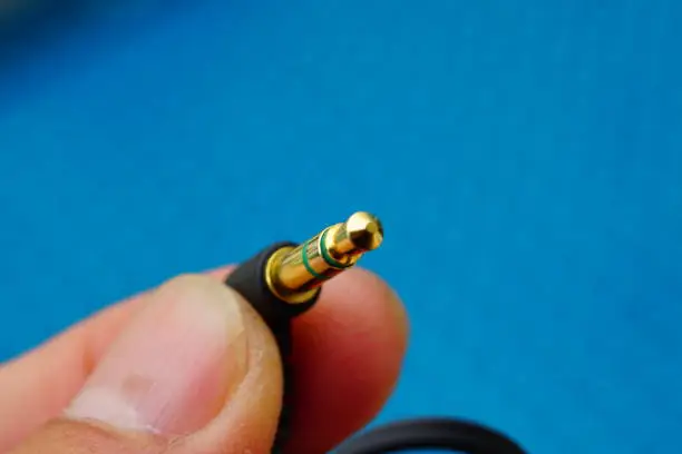 Photo of The tip of an earphone connector plated with gold