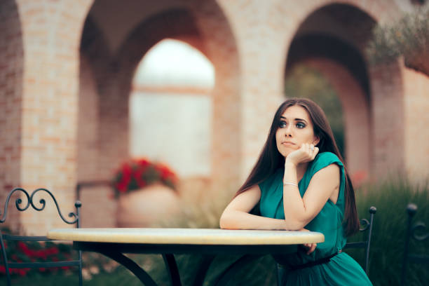 istock Sad Woman Being Stood Up on a Date in a Restaurant 820258394