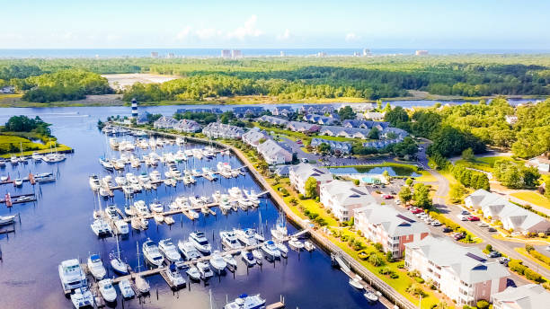 istock Aerial view of marina with lighthouse 820271876