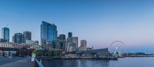 istock Seattle waterfront and Ferris Wheel at dusk 820272044