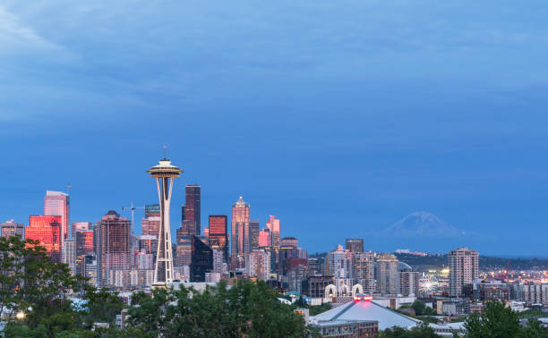 istock seattle evening skyline with space needle and mount rainier 820272050